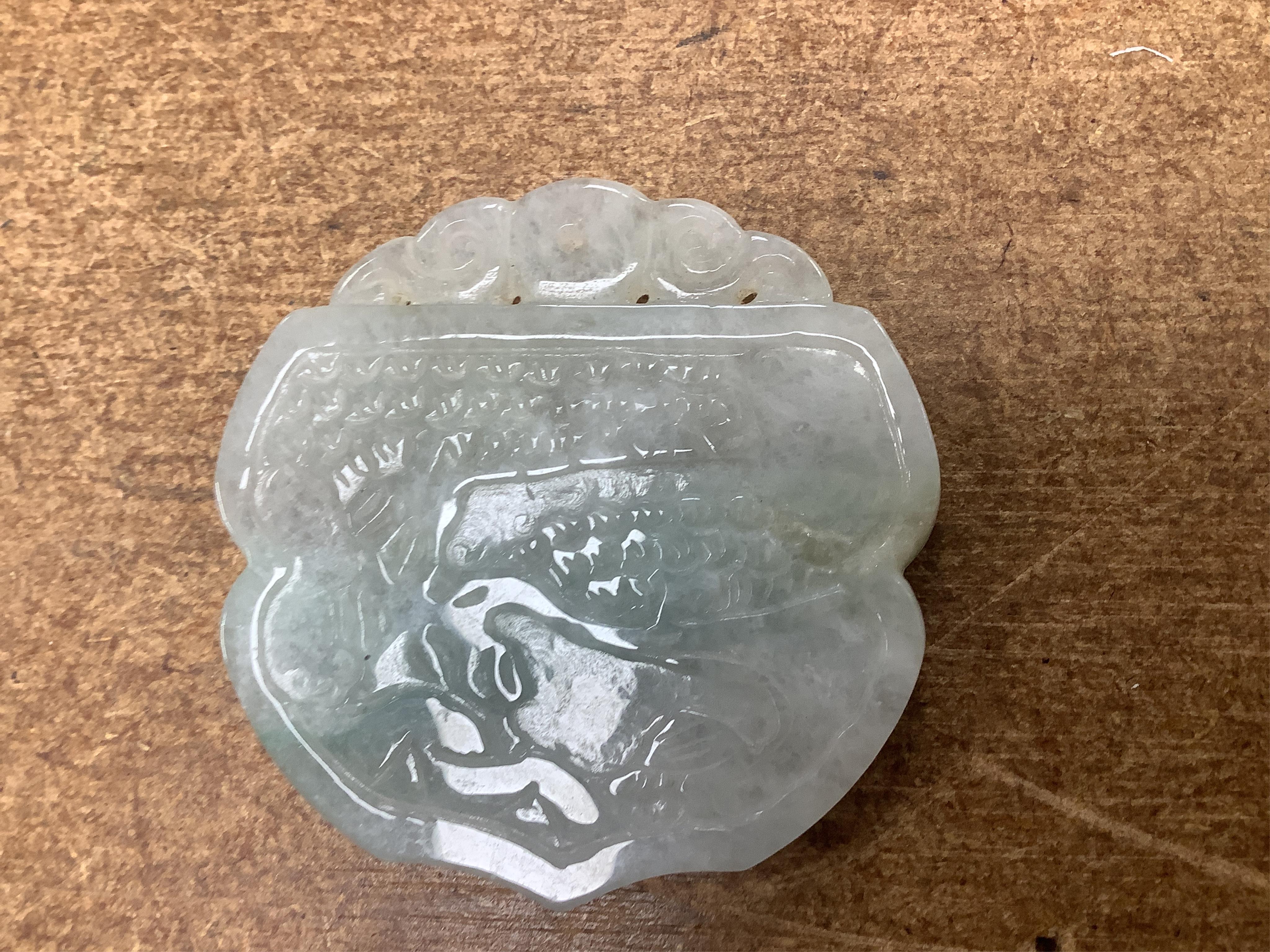Sixteen Chinese jade and hardstone carvings, including a gilded white metal and jadeite bracelet, three pendants etc. Condition - fair